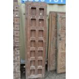 A pair of Indian carved hardwood panelled doors.