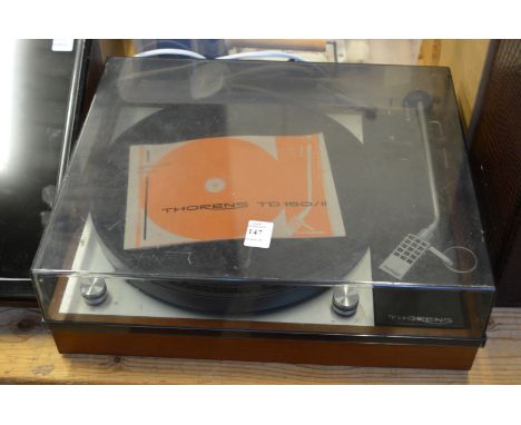 A Thorens TD150 turntable with original instruction manual.