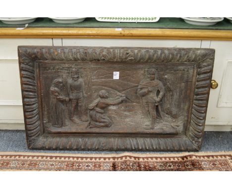 A carved wood panel.
