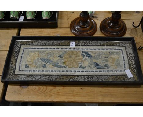 A Chinese silkwork panel, framed and glazed.