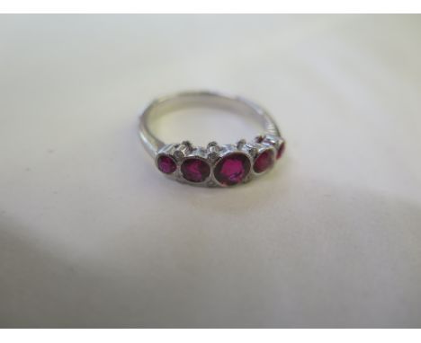 An 18ct white gold fine quality ruby and diamond ring, approx 3.6 grams, in good condition - size O 