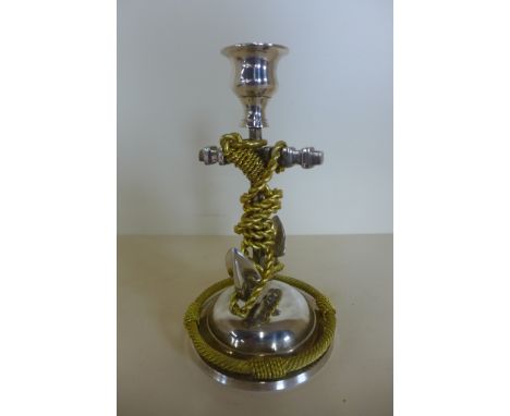 A silver plate and gilt brass anchor candlestick, 18cm tall, in good condition 