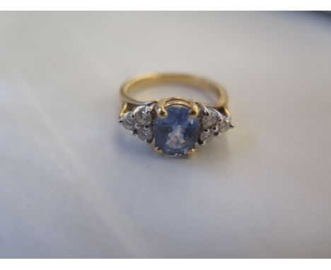 An 18ct yellow gold ceylonese sapphire diamond ring, size O, approx 5.2 grams, in good condition 