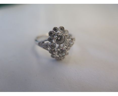 An 18ct white gold Art Deco style diamond ring, size O, approx 3.7 grams, in good condition, diamonds bright 