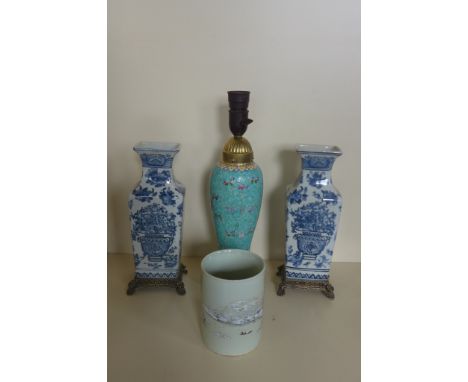 A pair of blue and white crackle glaze vases, approximately 29cm high - in good condition.  A Chinese style ceramic lamp base