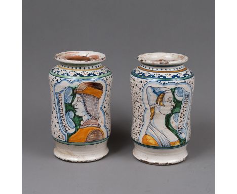 Pair of Albarello with painted male and female portrait. Descriptions and ornaments. Multicolours on white ground glaze. Nort