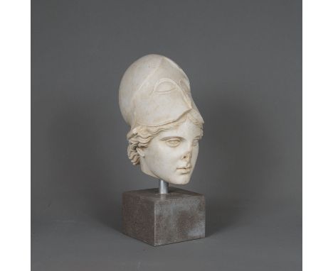 Minerva bust with helmet and waved hair. Nose and parts missing. Damages. On later grey stone base. Probably ancient earth fo