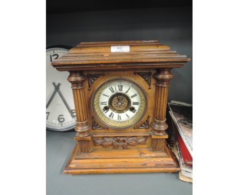 A bracket clock with enamel face marked H.A.C and made in Wurttembergchimes can not be slilents. 12" tall x 11" wide