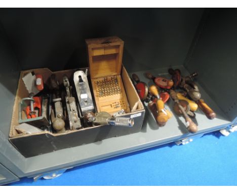 A selection of Diy and garage tools including spray gun nozzle set