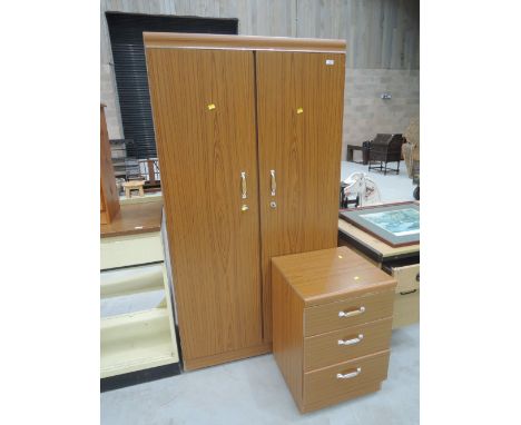 A vintage laminate wardrobe and bedside chest