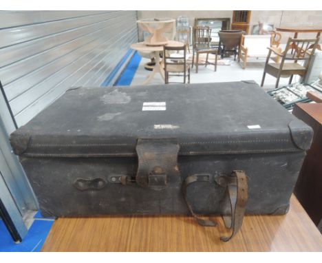 A vintage leather oversized suitcase/cabin trunk