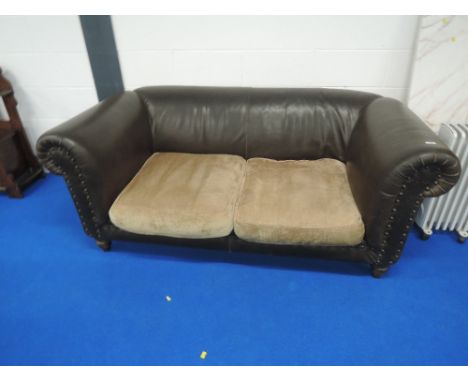 A vintage Chesterfield style brown leather settee 