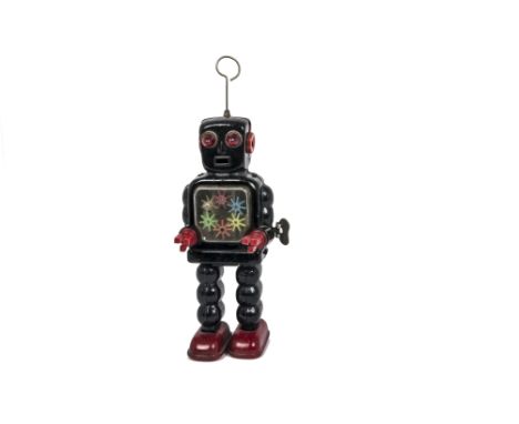 Yoshiya tinplate clockwork High Wheel Robot, in black, F, chest panel loose, some fading tested at time of catalogue, aerial 