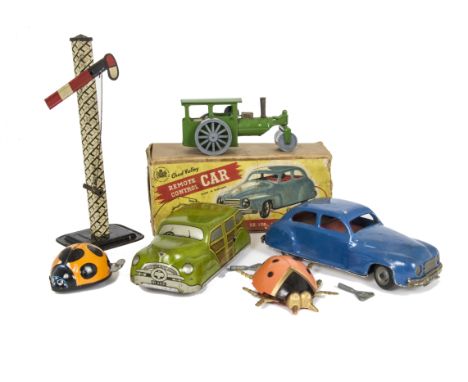 A Mettoy Tinplate Clockwork Woody Station Wagon, registration MT 3312, Tri-ang Minic clockwork Road Roller, Yone clockwork La