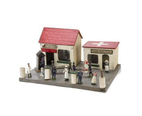 Military Medical figures by Britains, Crescent, Hilco, Fry etc, with a wooden, possibly home - made, First Aid Post and Clear