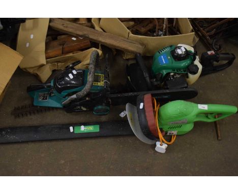 A Flora Best chainsaw together with a Garden Line chainsaw and a Garden Line hedgecutter (3)