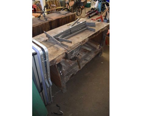 A workshop bench with vice