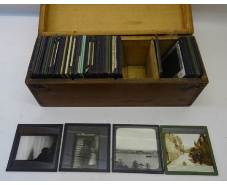 Three boxes of Magic Lantern Slides.