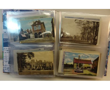 A Postcard Album and contents of approximately one hundred and forty vintage topographical cards. 