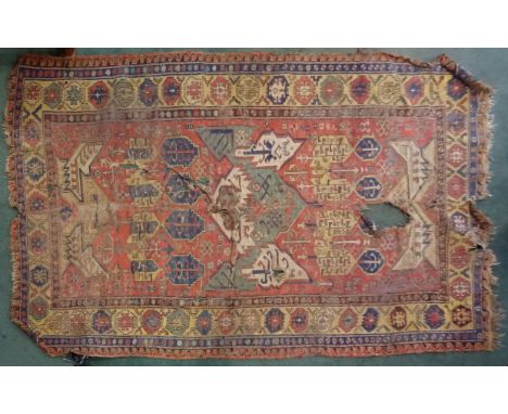 A Kazak Carpet of geometric design in red, blue, cream etc. with multi stripe geometric border (a/). 8' (244cms) x 5' 3" (160