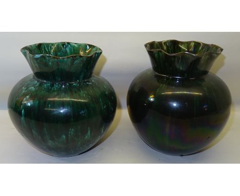 A pair of pottery baluster Vases of Linthorpe design with mottled green decoration and crimped rims, Numbered 197.    6" (15c