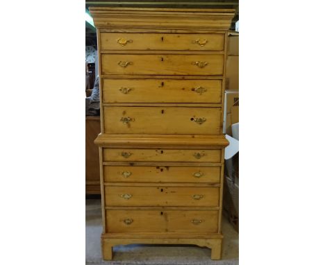 A 19th Century pine Chest on Chest, the upper section fitted with four long graduated drawers, with four further drawers unde