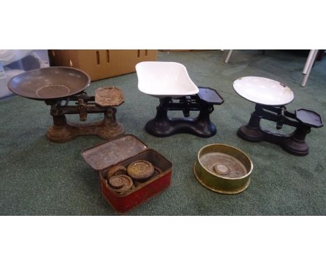 Three sets of old Kitchen Scales together with various weights and a brass Shell Case.