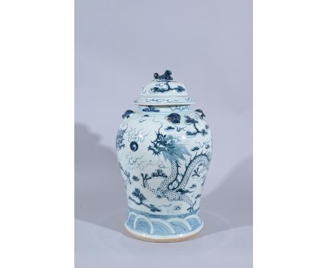 Chinese Blue & White Dragon Lidded VaseHeight: 19 in.  - Provenance: this item comes from the private collection of Lou A. an