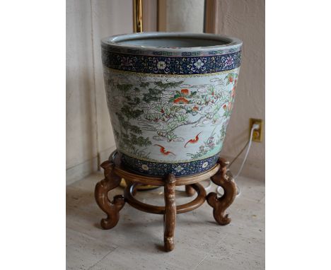 Large Chinese Porcelain Jardiniere on Stand.Dimensions: 19 x 20 x 12 in. (vase only)- This item is currently being stored off
