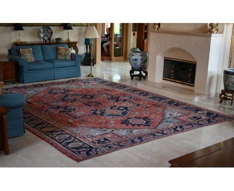 Hand Knotted Persian Heriz Rug.Size: 11'10" x 14'10" (142 x 178 in).- This item is currently being stored offsite at the esta