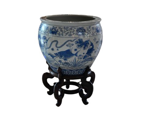 Large Chinese Blue/White Koi Fish Jardiniere.Dimensions: 22 x 22 x 16 in. (vase only)- This item is currently being stored of