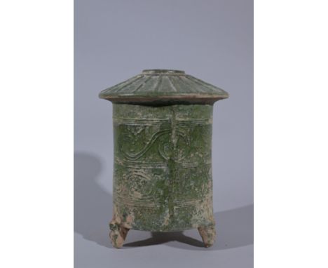 Chinese Han Dynasty green glazed granary urn, of cylindrical form surmounted by a slightly conical ribbed cover emulating a t