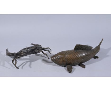 (2) Bronze Aquatic Sculptures. One sculpture of a crab along with a Koi fish.  - Provenance: this item comes from the private