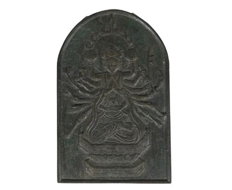 An Antique inscribed bronze plaque, of arched rectangular form, one side cast in relief with the multi-armed deity Avalokites