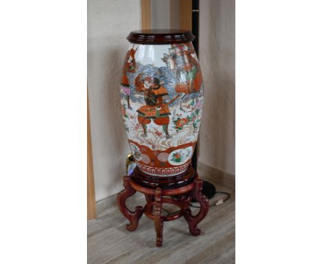 Signed, Large Japanese Samurai Vase on Stand.  Areas of loss near top of rim.  Marked on base.Dimensions: 27.5 x 13 x 12 in. 
