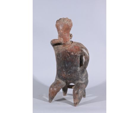 Large Pre-Columbian Nayarit San Sebastian Seated Figure.Large pre-Columbian Nayarit San Sebastian seated figure. The figure i