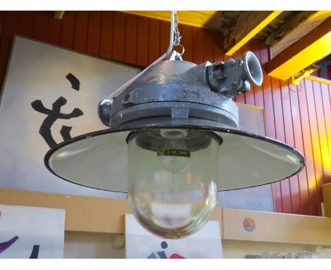 A Czech Republic explosion proof mine lamp fitted with an enamelled steel shade 