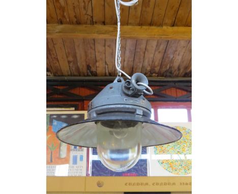 A Czech Republic explosion proof mine lamp fitted with an enamelled steel shade 
