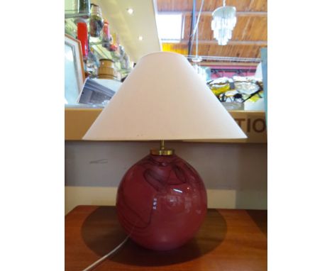 A large rust coloured Danish bulbous glass table lamp with later shade 