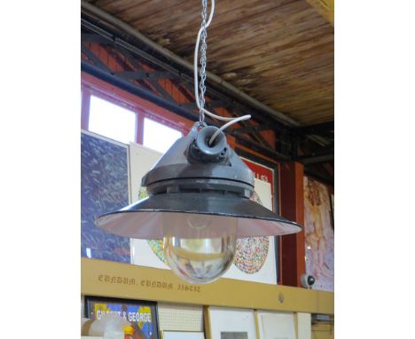 A Czech Republic explosion proof mine lamp fitted with an enamelled steel shade 
