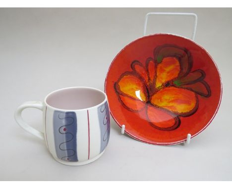 A 1950's Poole free form mug and a Poole delphis bowl, bowl is 16cm in diameter