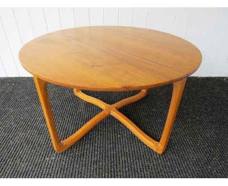 Ercol light elm and beechwood circular coffee table circa 1968-70. 83.5cm top