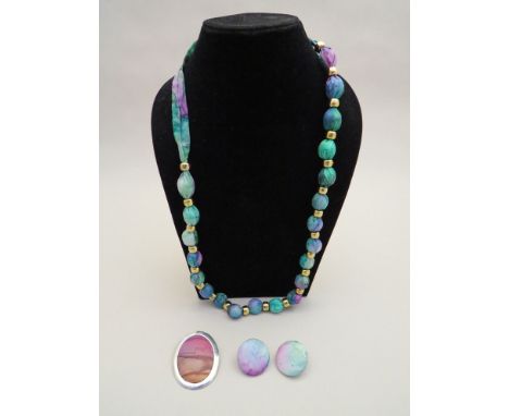 A 1970's/80's hand painted silk necklace and matching earrings along with a similar brooch from Liberty and Co.
