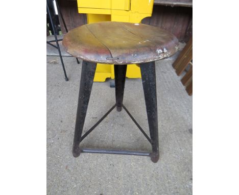 A 1930's steel workshop stool 