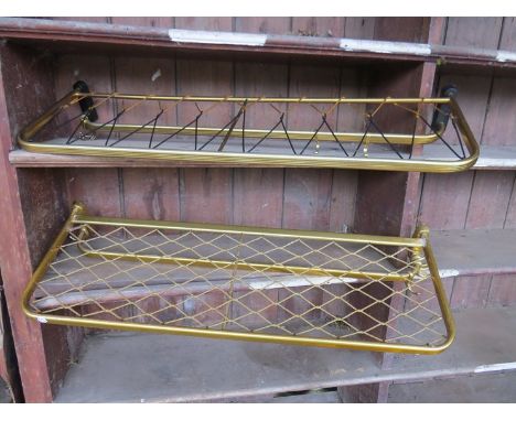 A pair of metal coat racks 