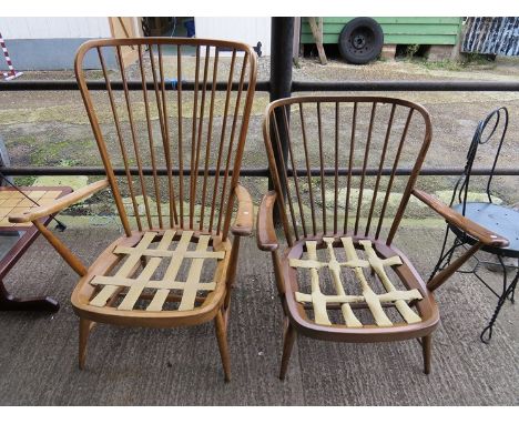 Two Ercol armchairs, one high back and one low 