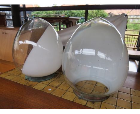 A pair of 'Shaws' glass globe light shades in clear and white and etched 'Shaws' to one 