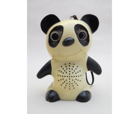 A novelty 1960's radio in the form of a Panda, made in Hong Kong 