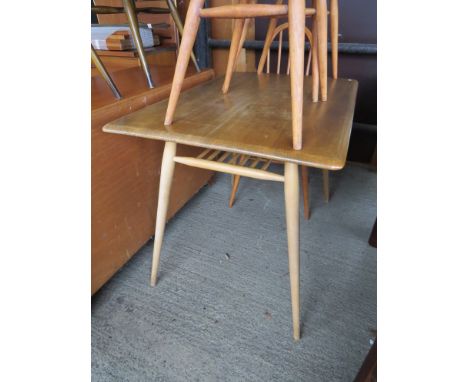 An Ercol dining table. 99cm x 70cm x 73cm