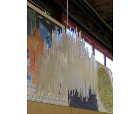 A ceiling light formed from three layers of textured lucite 